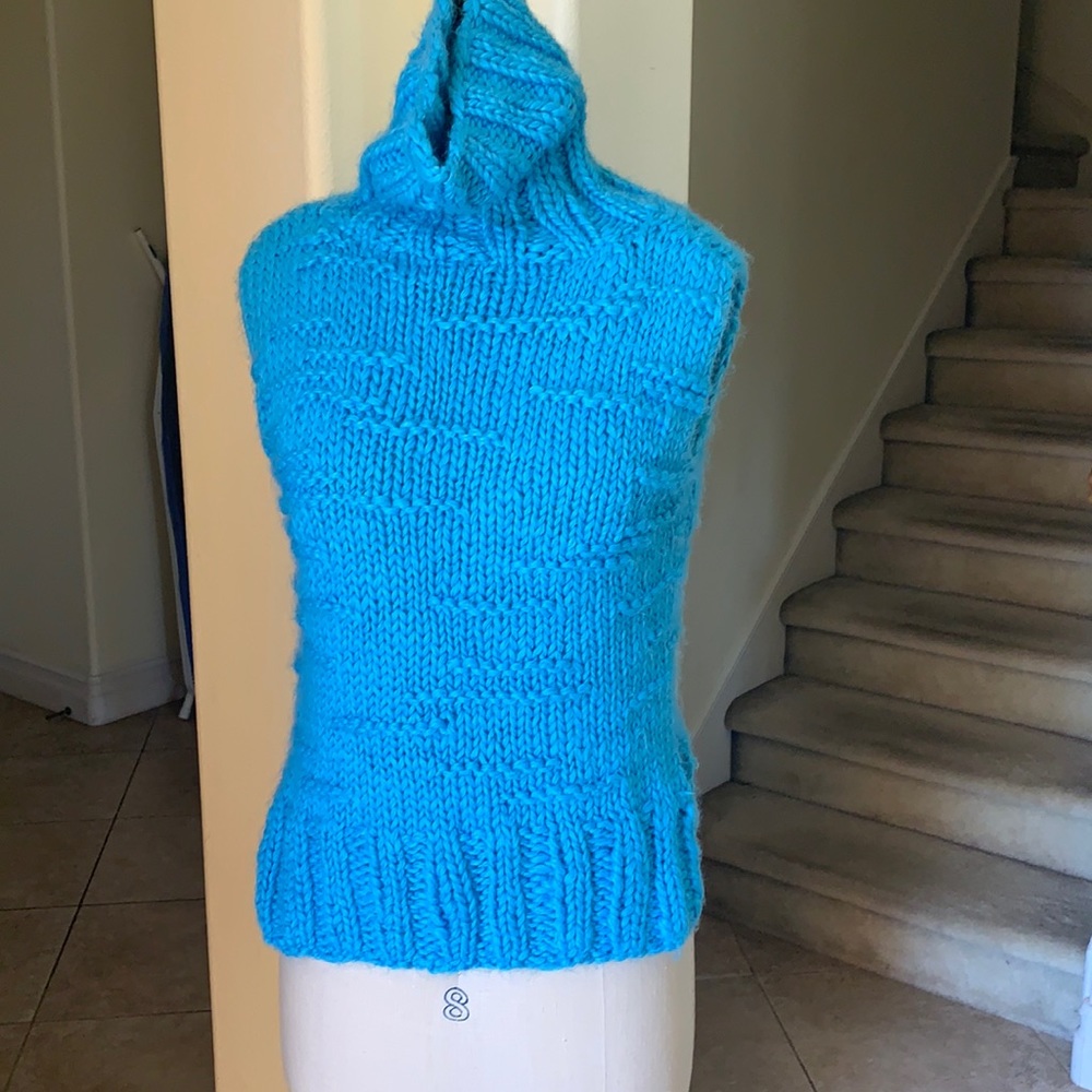 Super pretty blue Loose knit sleeveless turtleneck sweater.